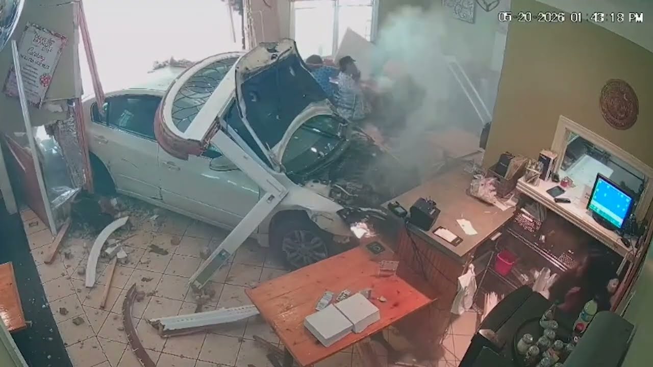 Car plows into Louisiana restaurant, just barely missing customers