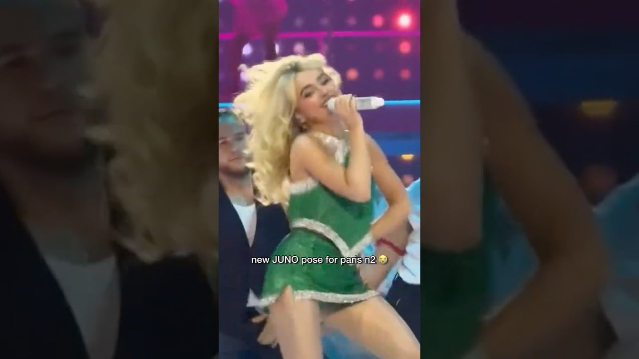 Sabrina does eiffel tower position for JUNO at paris