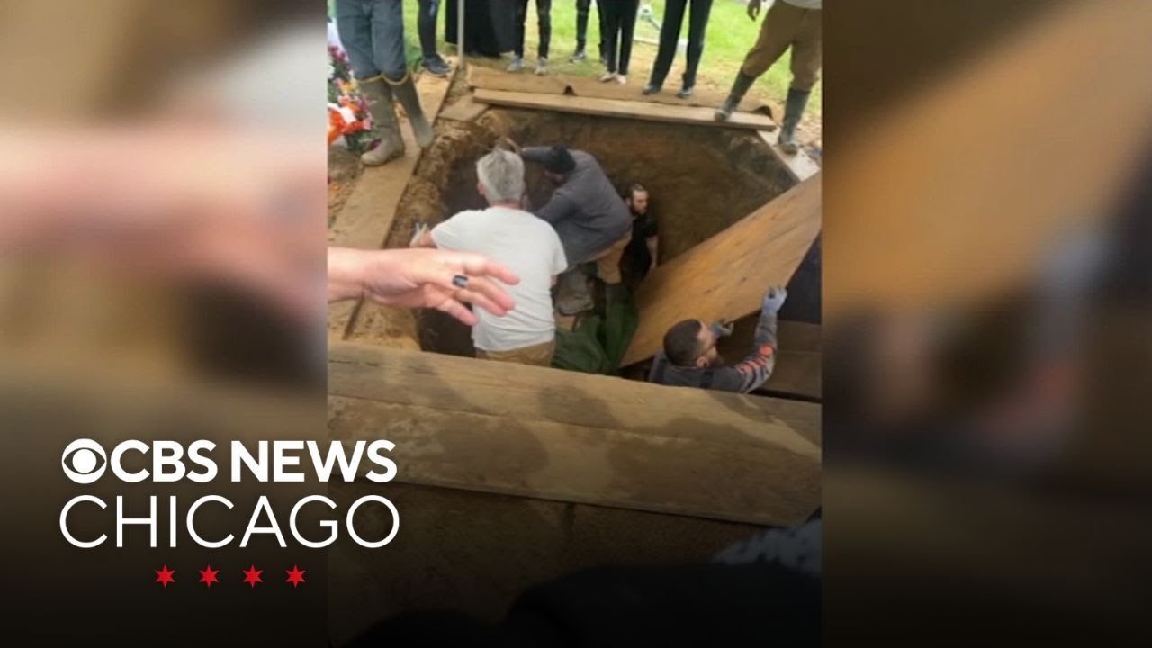 Pallbearers fall into open grave during Philadelphia funeral