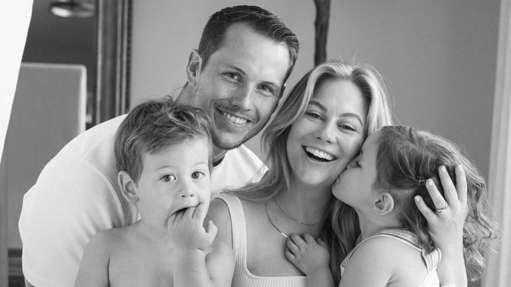 Shawn Johnson and Andrew East with their kids