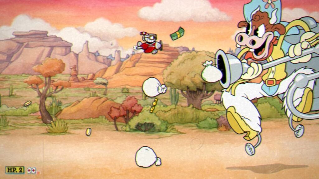 Cuphead battles a boss