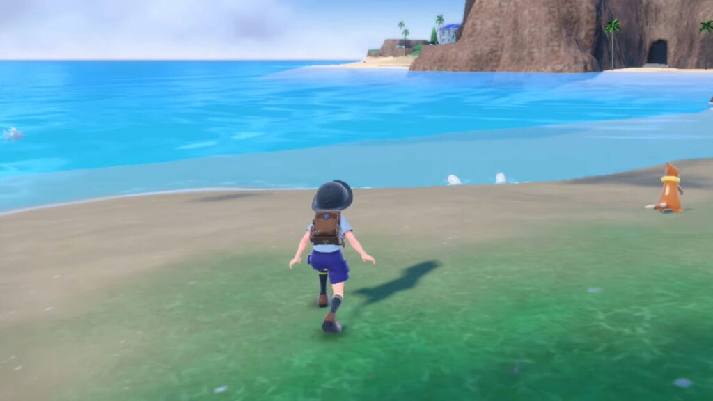 The player sneaks up on a Pokemon in Pokemon Scarlet and Violet