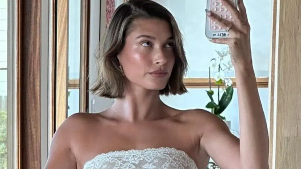 Justin Bieber's wife Hailey Bieber posing in white dress mirror selfie