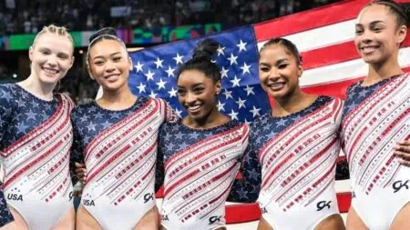 Simone Bile and the USA Women's gymnastics team at the Olympics after historic win