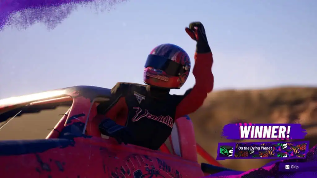 The winning racer pumps their fist in Monster Jam Showdown