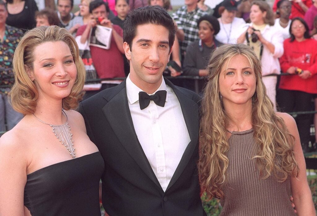 Jennifer Aniston, David Schwimmer, and Lisa Kudrow, during SAG Awards red carpet arrivals.