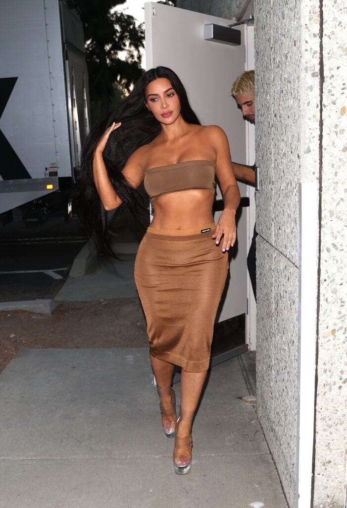 Kim Kardashian Slammed as ‘Desperate’ in Barely-There Nude Crop Top: ‘Only Missing a Pole’