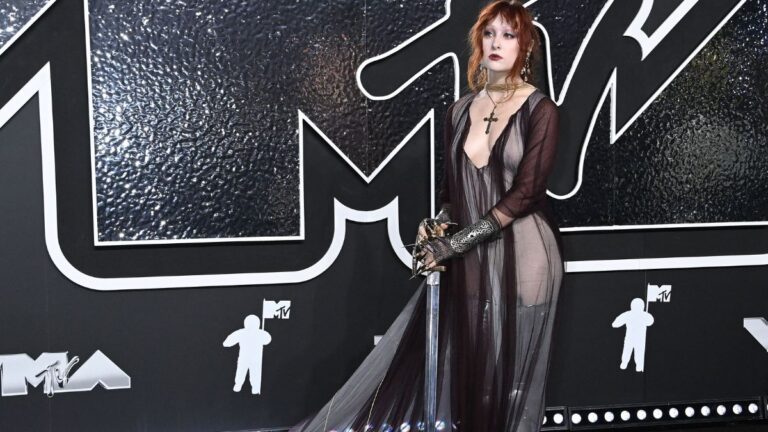 Chappell Roan Channels Her Best Henry Cavill With Ultra Revealing Antique Witcher-esque Dress and Matching Sword At the VMAs Chappell Roan VMAs