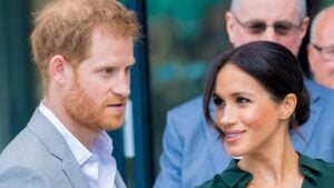 Meghan Markle glances at Prince Harry.