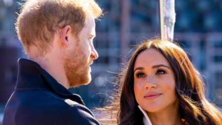 Prince Harry and Meghan Markle in conversation.