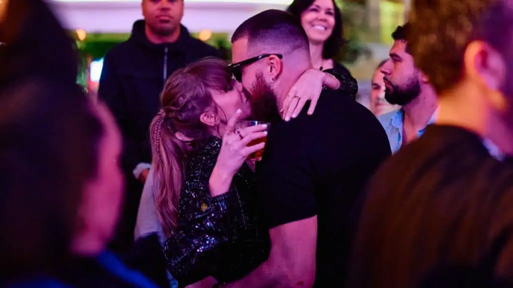 Taylor Swift and Travis Kelce shared a celebratory kiss in the DJ booth at XS Nightclub as the Kansas City Chiefs revelled in their Super Bowl win