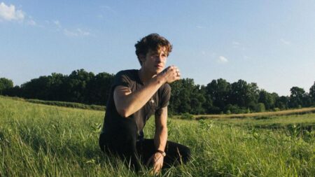 Shawn Mendes outdoors in a field
