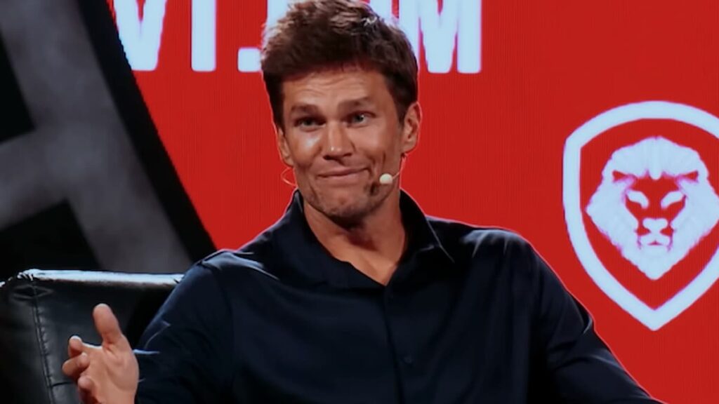 Tom Brady Blasted for Saying ‘Highly Offensive’ Slur During NFL Broadcasting Gig Tom Brady talking during podcast interview.