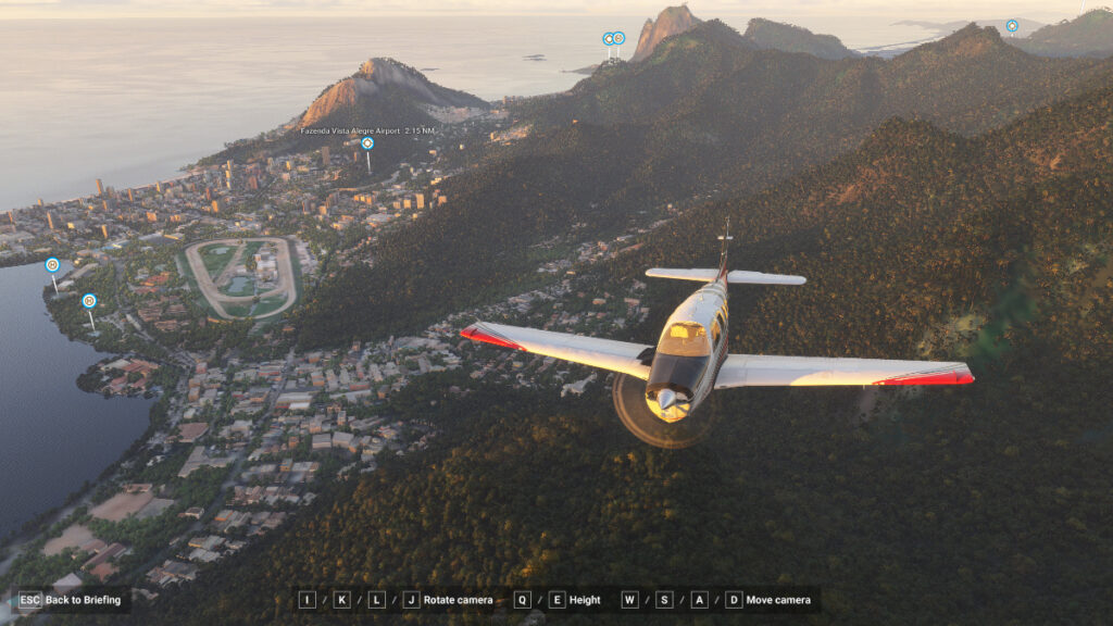 A plane cruises over a coastal city in Microsoft Flight Simulator 2024