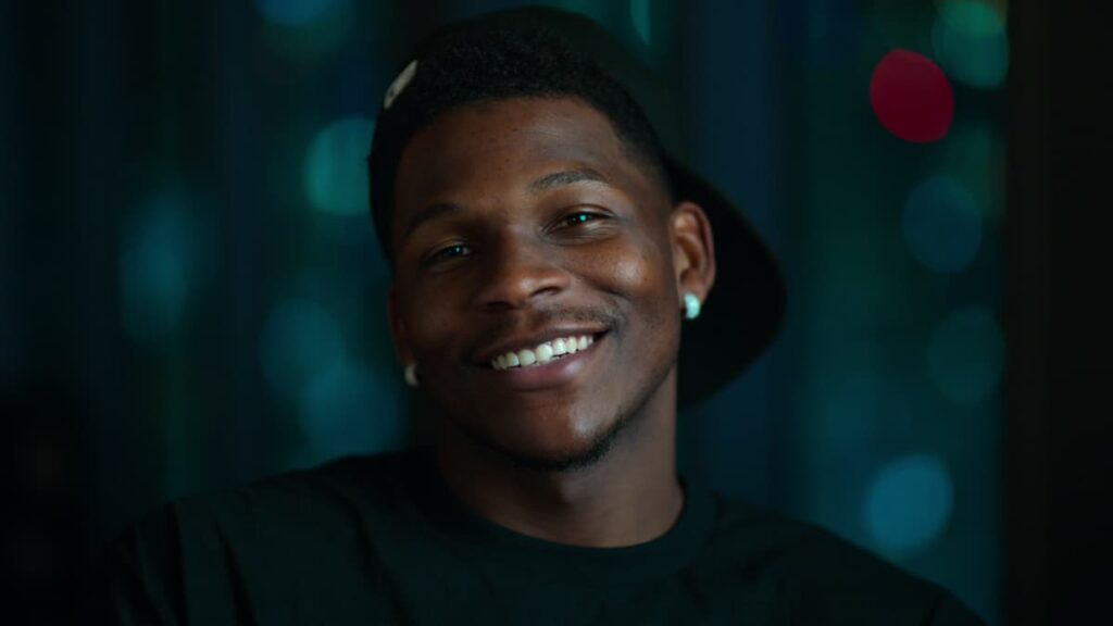 ‘Immature’ Anthony Edwards Blasted by NBA for Inappropriate Gesture Toward Fans Anthony Edwards smiling.