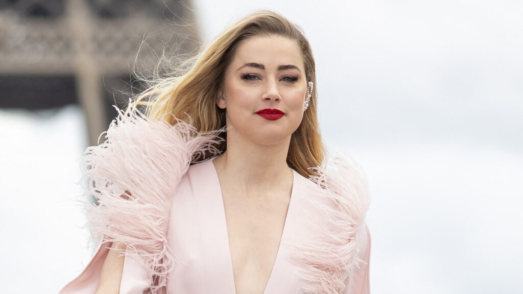 Amber Heard’s Pregnancy Announcement Sparks Debate About the Father: ‘Elon Did You Hook Her up Again’ Amber Heard at Le Defile L'Oreal Paris 2021 during the Fashion Week