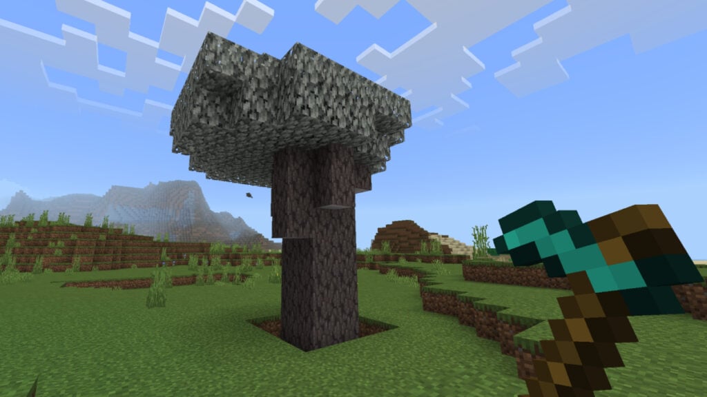 How To Grow a Pale Oak Tree in Minecraft A fully grown pale oak tree in Minecraft