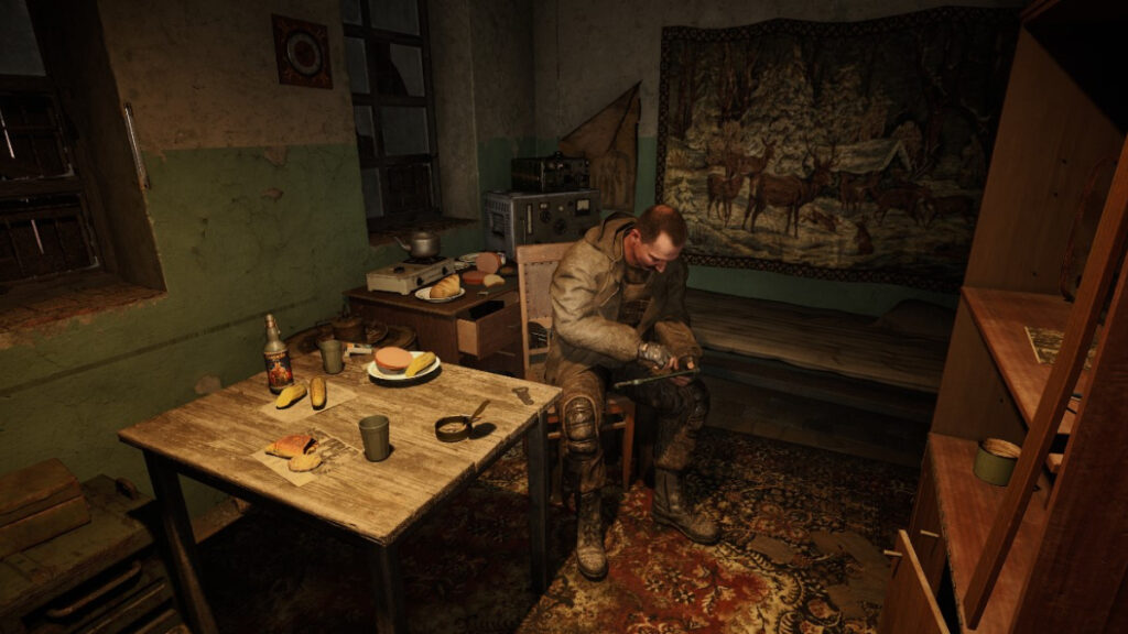 A trader sits beside a wooden table