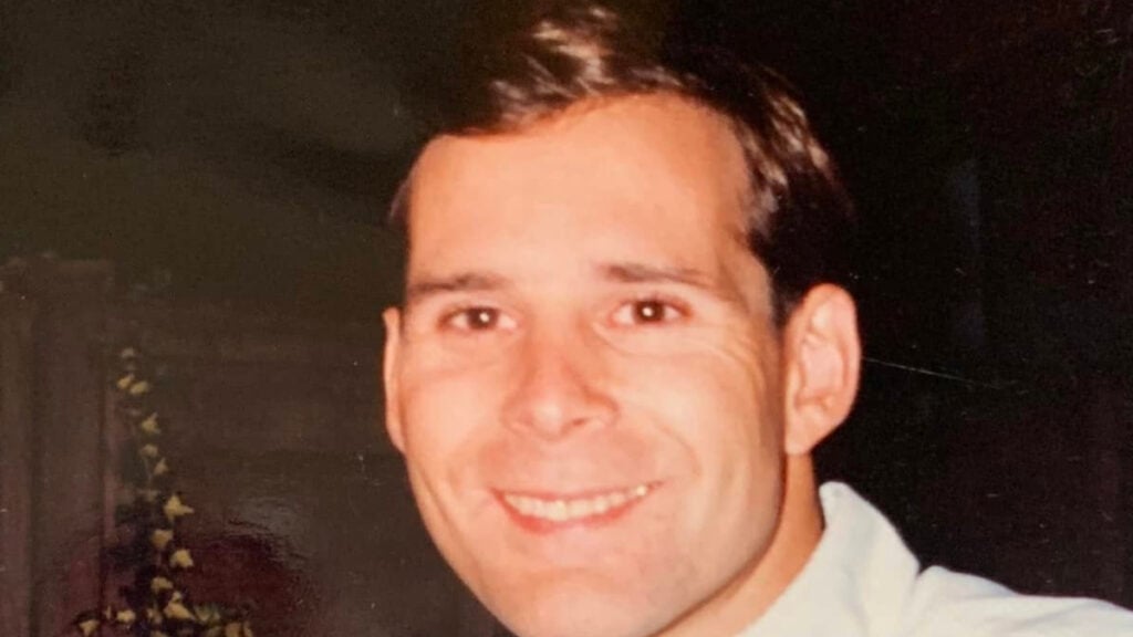 Killer Secrets: Inside the New Project by ‘The Crown’ Creator Featuring a Sinister Royal Tale Thomas Cressman wearing a white T-shirt with a smile on his face