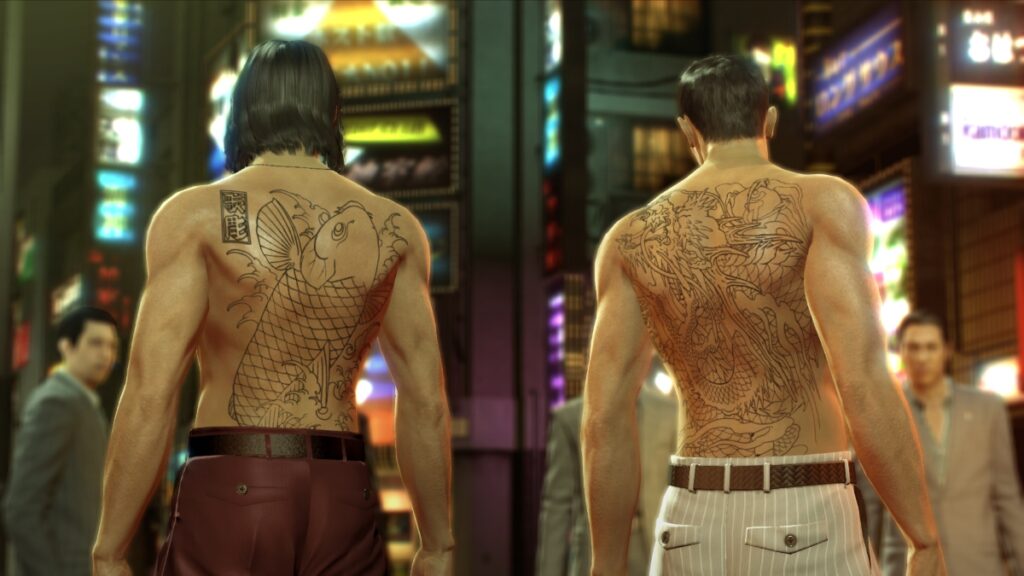 Two shirtless men stand side by side, revealing their extensive back tattoos in Yakuza 0