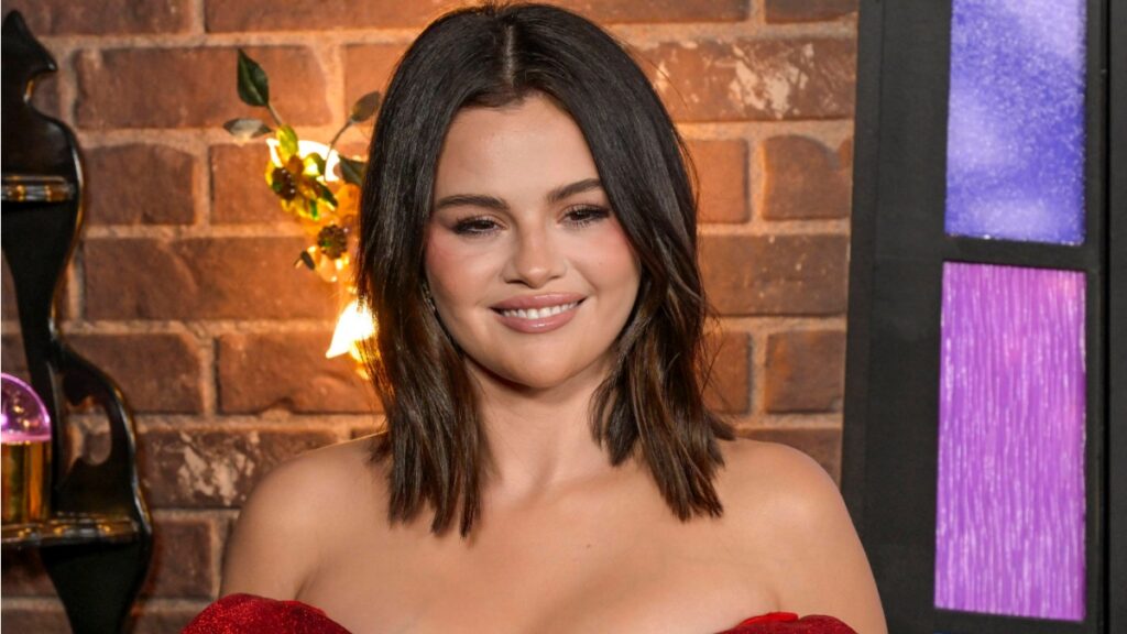 Selena Gomez Wants Justin Bieber ‘To Stay Far Away’ From Her Wedding To Benny Blanco: ‘She Doesn’t Want To Look Back’ Selena Gomez in a red dress.