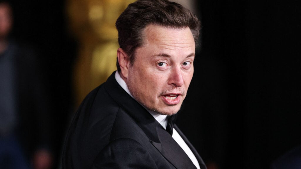 Tesla CEO Elon Musk attends  formal event.