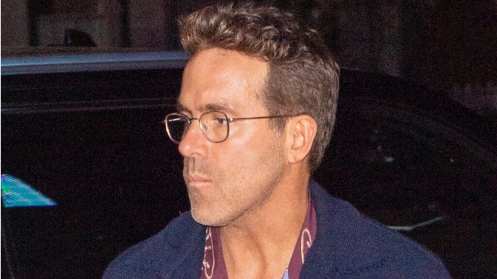 Ryan Reynolds Ignites Health Fears With ‘Unwell’ Look During Night Out Sans Blake Lively: ‘Guilt Catching Up With Him’ Ryan Reynolds wearing glasses.