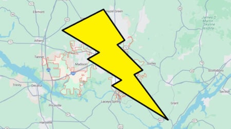 A map of Huntville, Alabama with a giant electric bolt, symbolizing the spike in electricity bills after Trump's EO