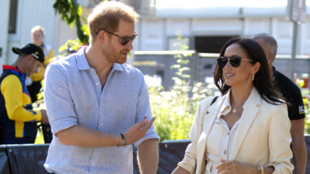 Prince harry and Meghan Markle, the Duke and Duchess of Sussex attend an Invictus Games cycling event.