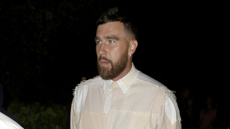 NFL Fans Scream ‘Excuses’ at News of Travis Kelce ‘Battling a Pretty Big Illness’ Before the Super Bowl Travis Kelce is seen leaving Carbone beach tent wearing a bizarre patch outfit after attending Miami F1 Grand Prix without Taylor Swift