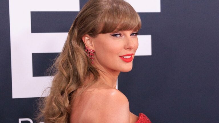 Taylor Swift wears a red dress to the Grammys