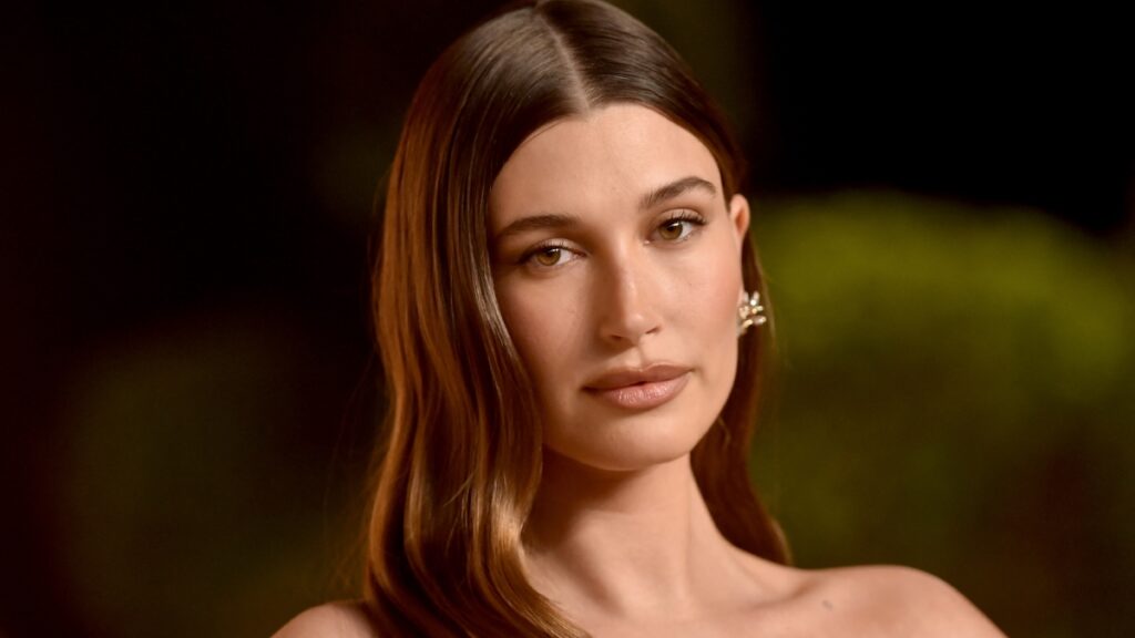 Hailey Bieber Says Navigating Postpartum and Internet Trolls Is ‘A Crazy Life to Live’ Hailey Bieber attends an event for Vanity Fair Oscar Party