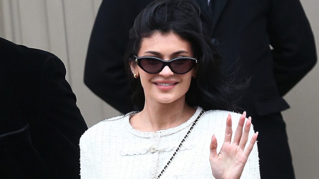 Kylie Jenner waves to cameras