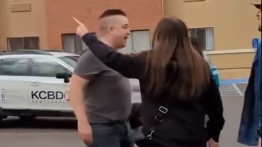 Law-breaking Texas Racist Heckles Immigrant Rights Protest, Loses Shouting Match: ‘Get the F**k Out of My Country!’ Texas protest racist image