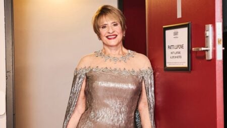 patti lupone in a silver dress