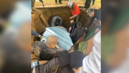Pennsylvania pallbearers fall into open grave during Philadelphia funeral