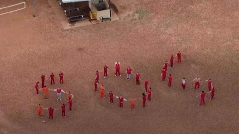 A picture of Texas detainees calling for help.