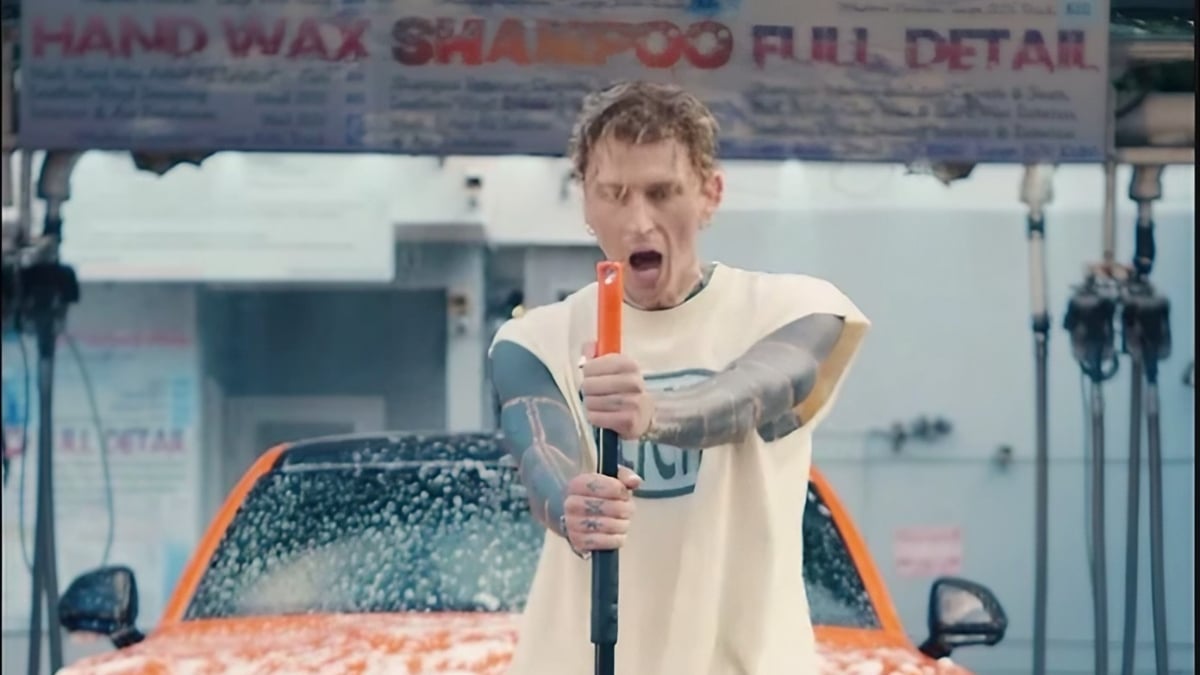 Machine Gun Kelly Fans Blame Eminem for MGK’s New Boyband Song: ‘Squirt Gun Kelly Used to Rap’