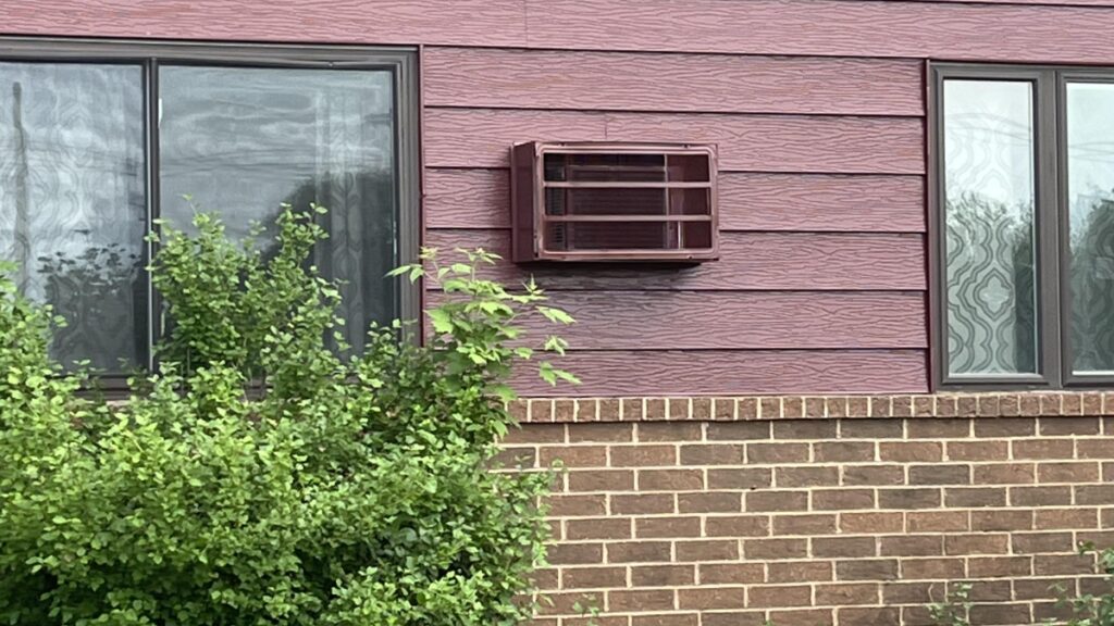 Minnesota landlord paints A/C unit