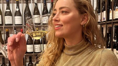 ‘Toxic’ Amber Heard Returns To Acting, But Fans Aren’t Having It: ‘Dreadful Actress’ Amber Heard sipping wine