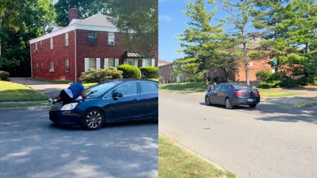 Man on hood of a car