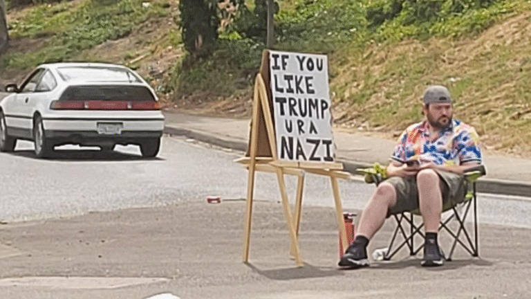 Washington Man Sits on Road All Day ‘Doing What He Loves,’ Calling Trump Supporters ‘Nazis’: ‘Respect the Grind’ Washington Man Sits on Road All Day ‘Doing What He Loves,’ Calling Trump Supporters ‘Nazis’