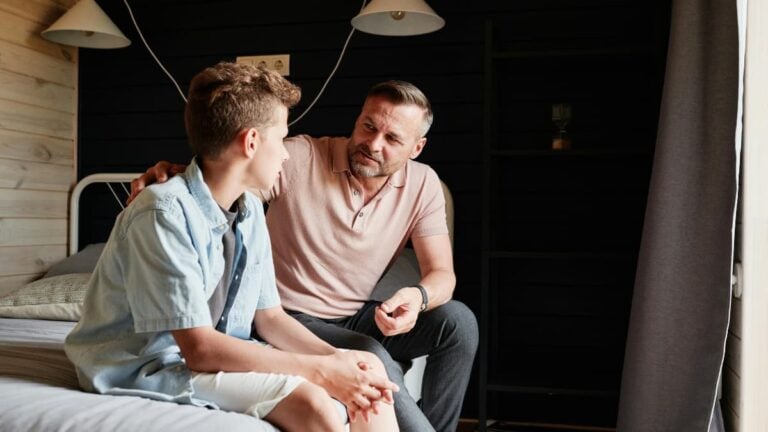 A picture of a father and a son in relation to the Oregon father.