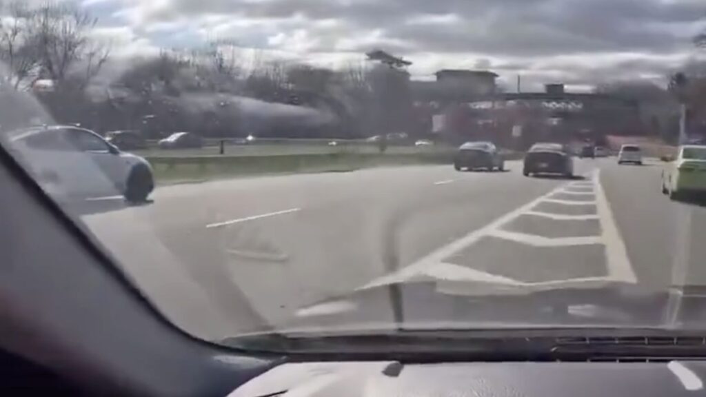 New york driver almost hits cop