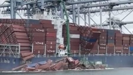 Shipping containers fall off the Mississippi in Long Beach, California