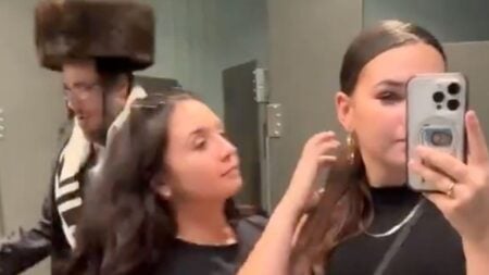 Women catch man in women's bathroom